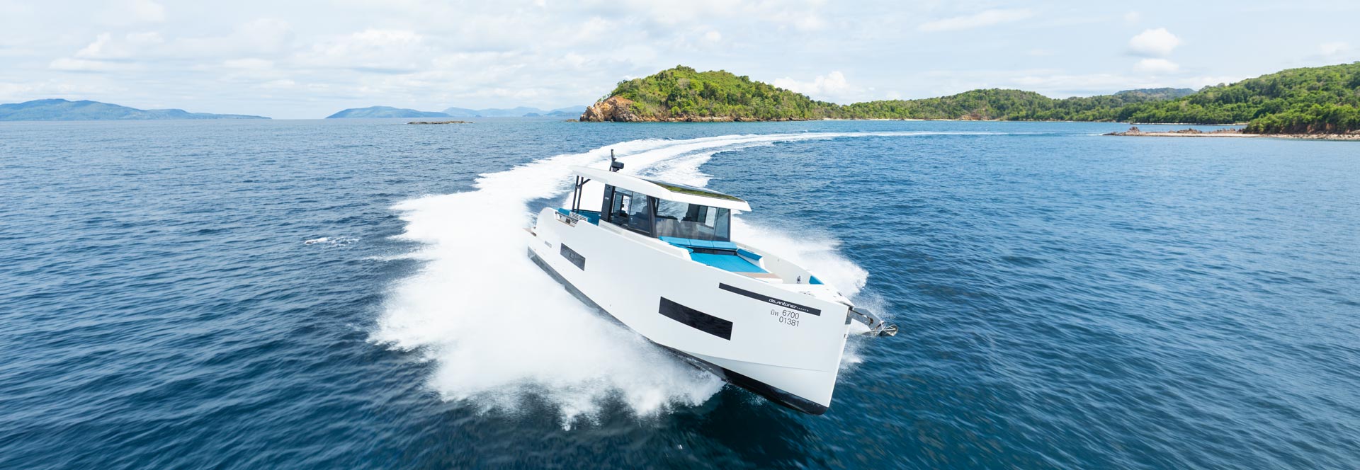 De Antonio D50 Coupe cruising on turquoise water
