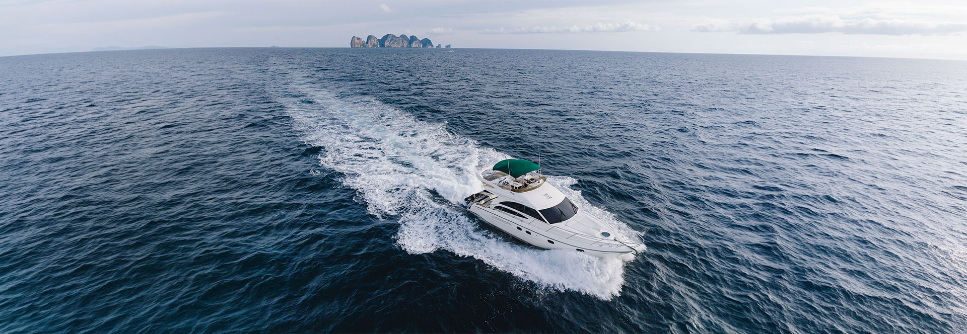 Princess 42 cruising on turquoise water